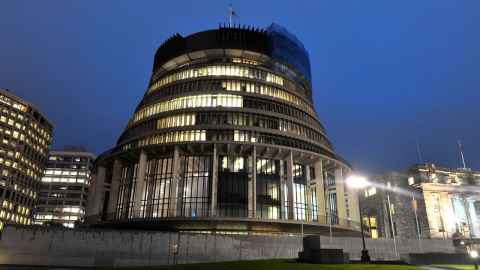The Beehive and Parliament Buildings at night.