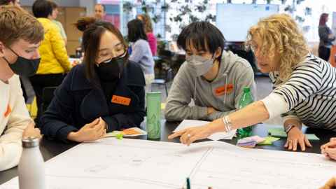 The programme manager working with a Solve It team