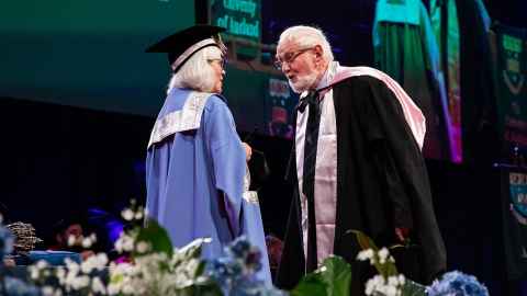 Emeritus Professor Alan Kirkness receives a DLitt from Vice-Chancellor Professor Dawn Freshwater.