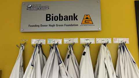 Centre for Brain Research's Biobank, with white lab coats hanging on hooks