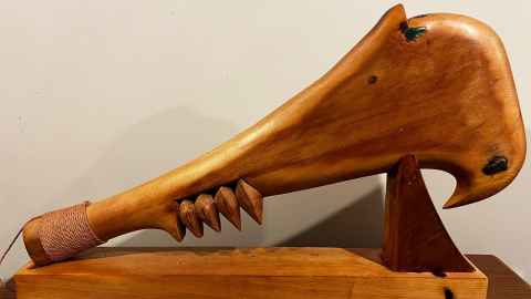 A wooden club.