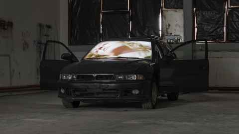 A car with doors open.