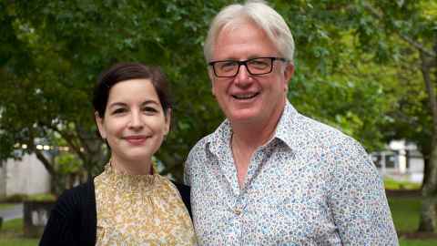 Education experts Dr Claudia Rozas Gómez and Professor Peter O’Connor. They're standing together in front of a tree.
