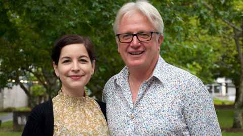 Education experts Dr Claudia Rozas Gómez and Professor Peter O’Connor. They're standing together in front of a tree. 