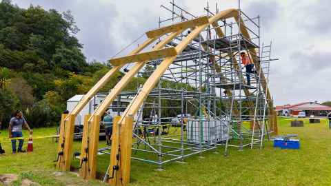 The timber portals use interlocking compression joints, instead of bolting parts together.