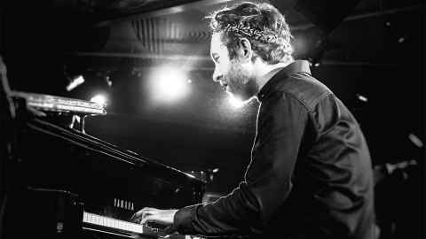 Jazz musician Michal Martyniuk plays the piano