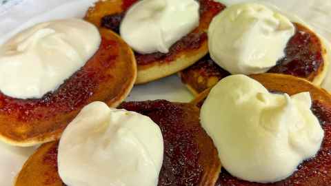 Plate of pikelets with homemade jam and cream made by Waiora Port