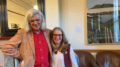 Author Greg O'Brien with Linda Tyler and a Binney artwork at right. At the launch of Don Binney: Flight Path at OGH 19 October 2023.