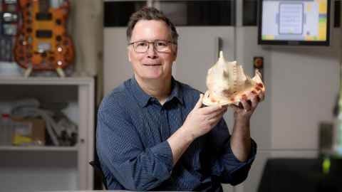 Professor Olaf Diegel with a replica of the conch shell that he printed for University Kaiarataki Michael Steedman. 