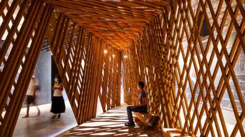 A space in a building sectioned off with unpainted timber.