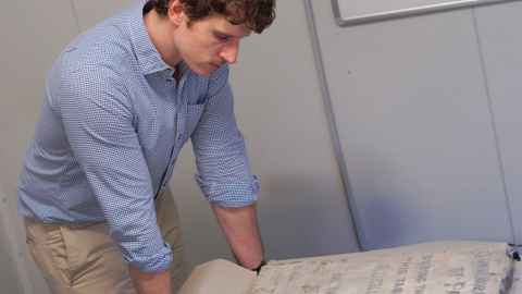 Faculty of Arts history lecturer Dr Rowan Light takes a look at the  heavy stone plaque. 