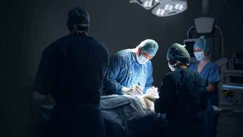 Image of surgeons in operating theatre