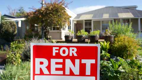 For Rent sign outside house