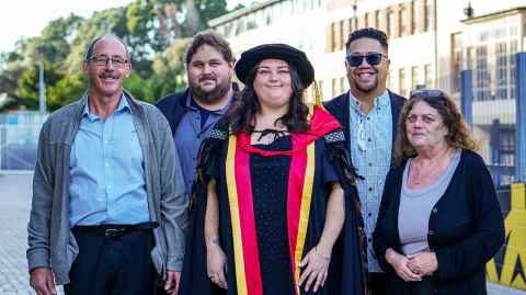 Dr Ashlea Gillon with her whānau on graduation day.