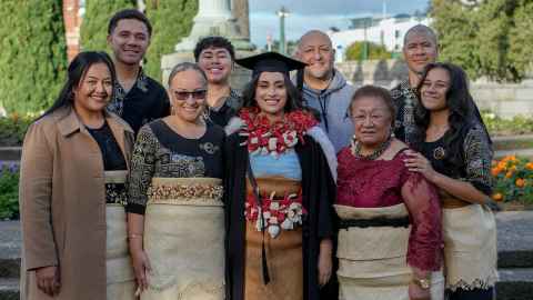 Image of Law and Arts graduate Siobhan Sharkey with her family on graduation day.