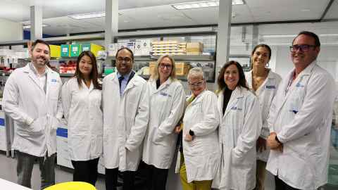 Line of people in labcoats