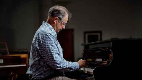 Professor David Lines playing piano at the School of Music