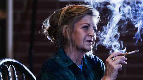 Image of middle-aged women smoking