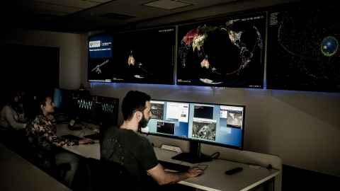 Staff at the Mission Operations Control Centre at Te Pūnaha Ātea Space Institute.