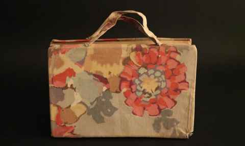 Midwifery textbook with a home-made carry case