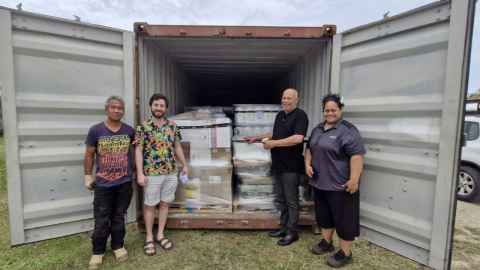 Niue cool roof application lead Hivi Puheke, Noah Bunkley, Sir Collin Tukuitonga, and Niue site lead Jama'l Talagi-Veidreyaki.