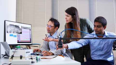 Professor Leo Cheng, pictured left, will be given $1.2 million in funding
