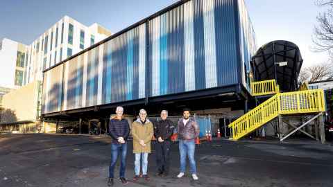 From left, Associate Director of Planning and Development Tristram Collett,  Property Services Programme Manager Alistair Allan, project managers Martin Ballard and Nat Warmington. Photo: Chris Loufte