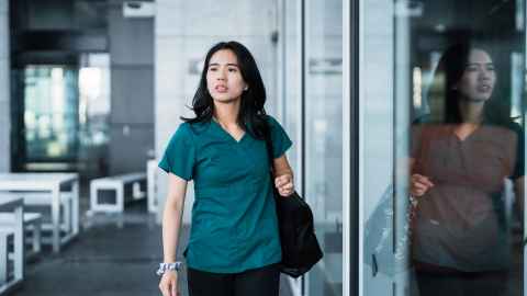 Nurse leaving hospital after shift