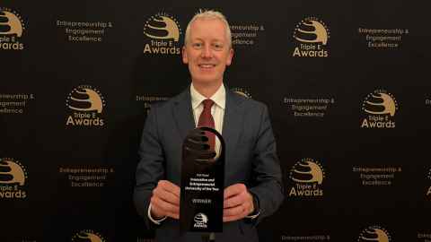 Deputy Vice-Chancellor Strategic Engagement Dr Erik Lithander with the award for named Innovative and Entrepreneurial University of the Year.