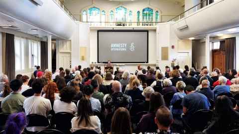 The University of Auckland great hall with a packed out audience to hear the director of Amnesty International speak.