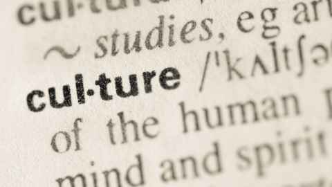 close up of dictionary on the definition of culture 