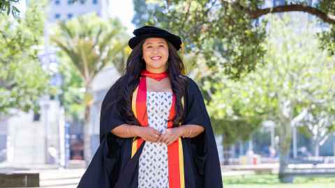 Zanetta Toomata in her doctoral graduation garb.