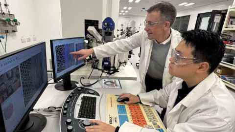 Dr Gary Raftery with student