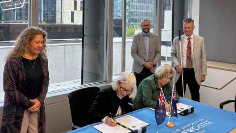 Image of VC and Chancellor signing documents