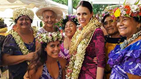 Dame Jacinda Ardern in the Cook Islands with a group of local women
