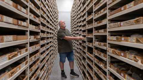 Neville Hudson with geological collections files