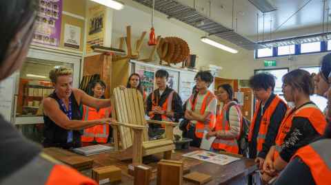 Charlotte McKeon and Xin Cheng talk students through building and design.