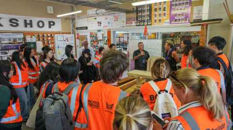 Students gather at the Trade Academy to learn more.