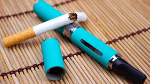 broken cigarette and vape cartridge 
