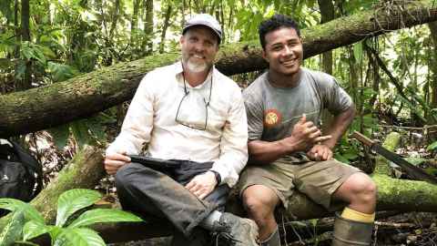 Professor Ethan Cochrane in the field in Sāmoa with a local colleague.