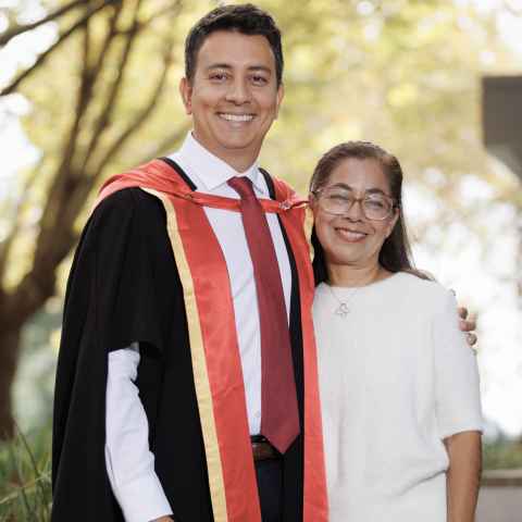 Luis and his mother, Luisa, on graduation day. Photo: Chris Loufte