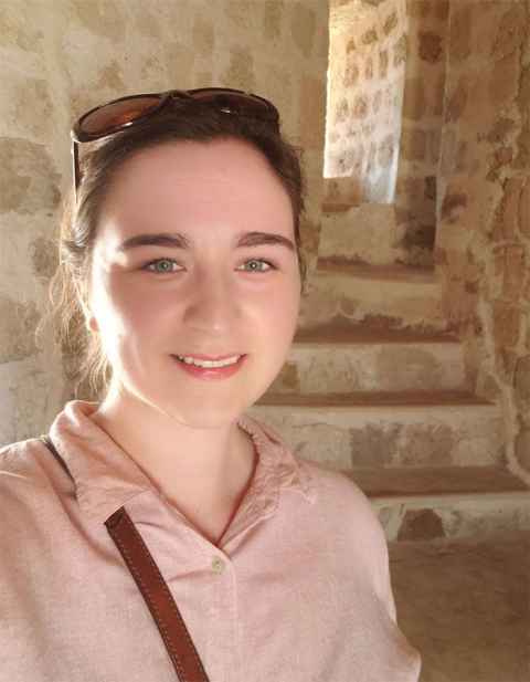 Dr Caitlin Smith inside the Qal'at al-Bahrain Fort during her PhD research.