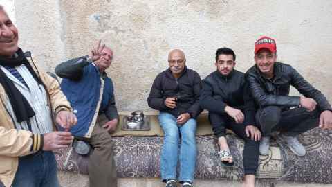 Jitendra has tea with victims of the Turkey-Syria earthquake in 2023.