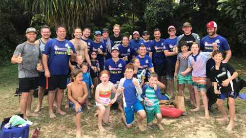 Calven with Titans rugby club members