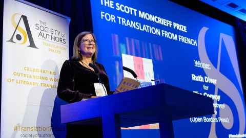 Ruth Diver receiving the Scott Moncrieff Prize. 