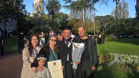 Omar and his family with the Clocktower in the background