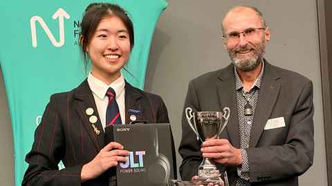Brain Bee winner Tianyi Lu from Rangitoto College with Rich Easton, Neurological Foundation CEO.