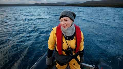 Associate Professor Emma Carroll pictured on a boat at sea. Photo: Richard Robinson.