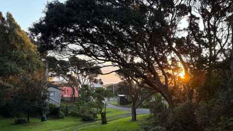The view of Ripiro Beach at sunset from the Barron's bach. Photo: Avril Bell