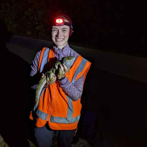 Cam Hoffbeck with a tuatara. 